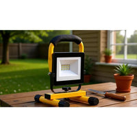 Eurolux black & yellow floodlight shown in its packaging