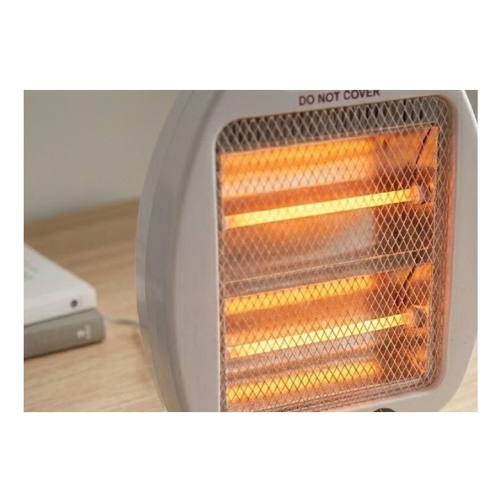 Radiant white heater installed and lit