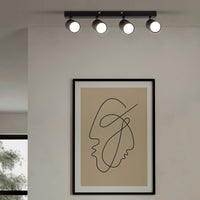 Urban white and black downlight shown in its packaging
