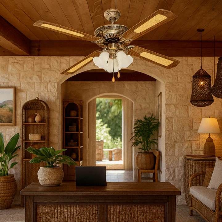 Radiant antique brass ceiling fan installed and lit