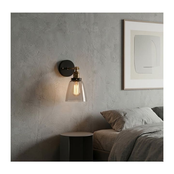 Close-up detail of the Eurolux antique brass & black wall light