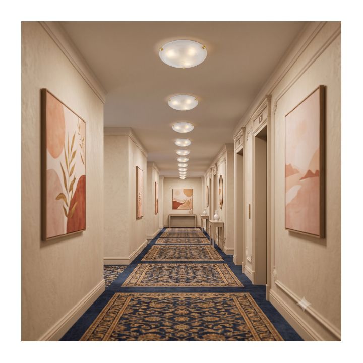 Eurolux polished brass ceiling light installed and lit