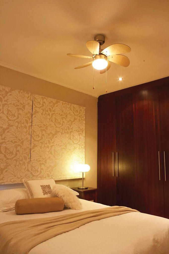 Eurolux satin chrome/cherry wood ceiling fan shown in its packaging