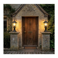 Eurolux black wall light installed and lit