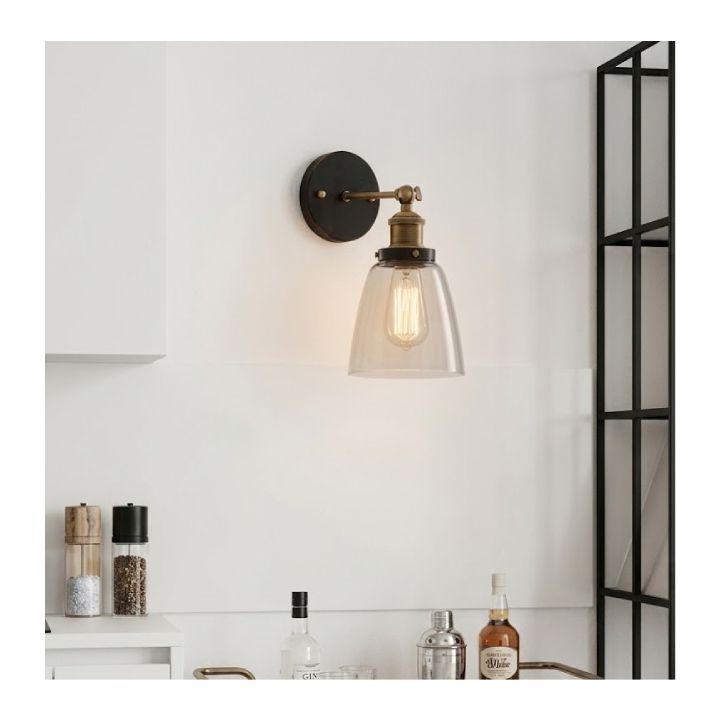 Eurolux antique brass & black wall light shown in its packaging