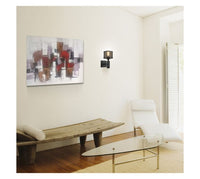 Radiant wall light shown in its packaging