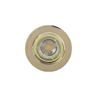 Radiant brass downlight installed and lit