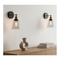 Eurolux antique brass & black wall light installed and lit