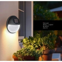 Eurolux black garden light installed and lit