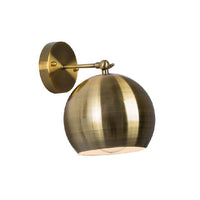 Eurolux antique brass wall light installed and lit