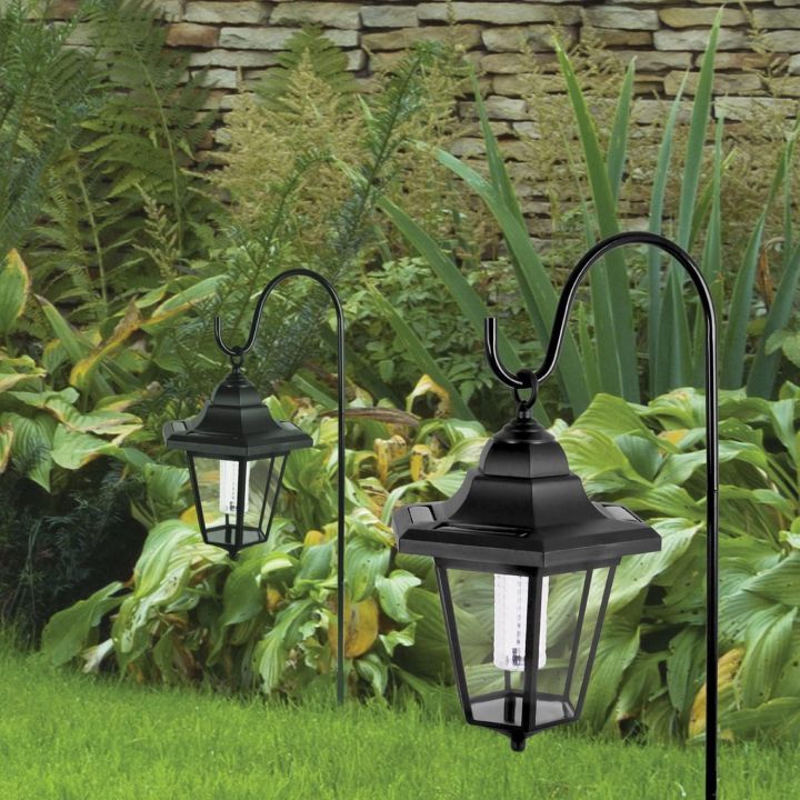 Eurolux black garden spike light installed and lit