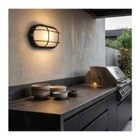 Eurolux black bulkhead light installed and lit