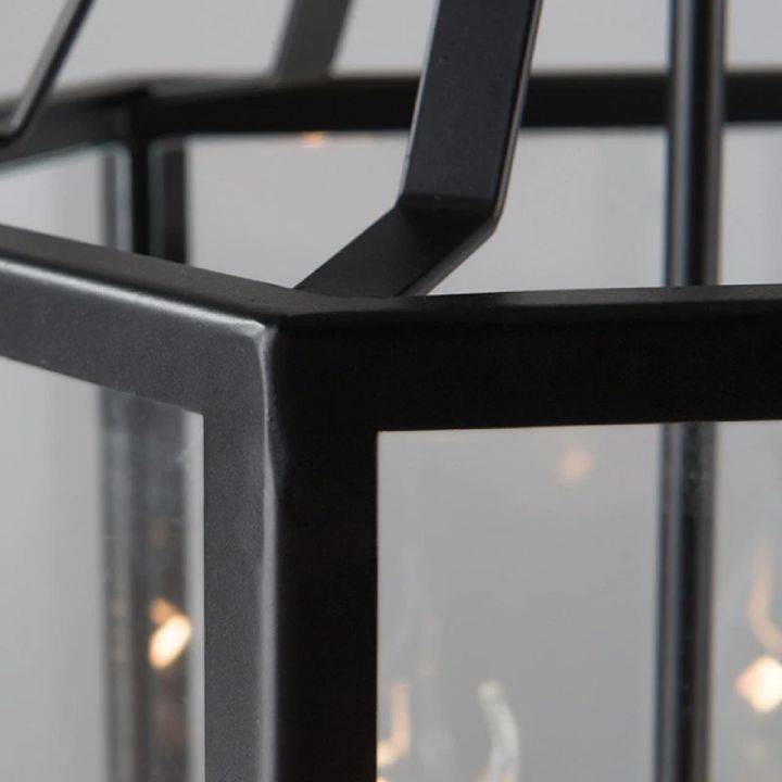 Eurolux black wall light shown in its packaging