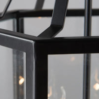 Eurolux black wall light shown in its packaging